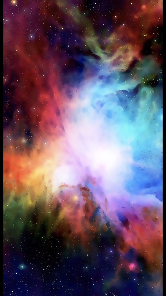 赤と青が渦巻く鮮やかな星雲