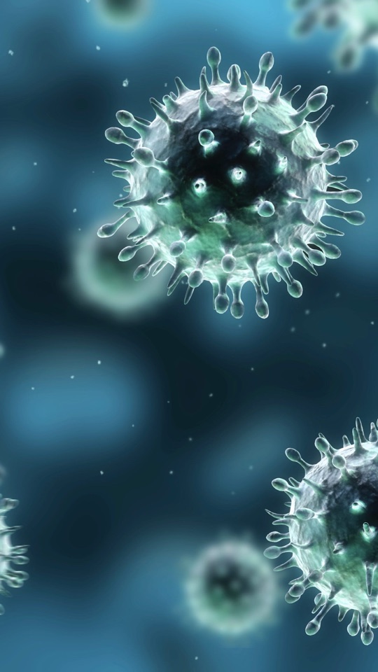 暗い青緑の背景に、突起をまとった球状のウイルスが浮かぶ科学的なイラスト。